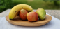 Preview: Handgefertigte Eichenholz-Schale von mARTinWood mit frischem Obst